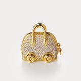 Sparkle Gold—Bijou de sac Bolide sur roues