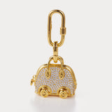 Sparkle Gold—Bijou de sac Bolide sur roues